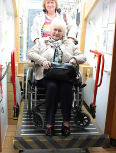 Wheelchair on Copper Jack's lift 